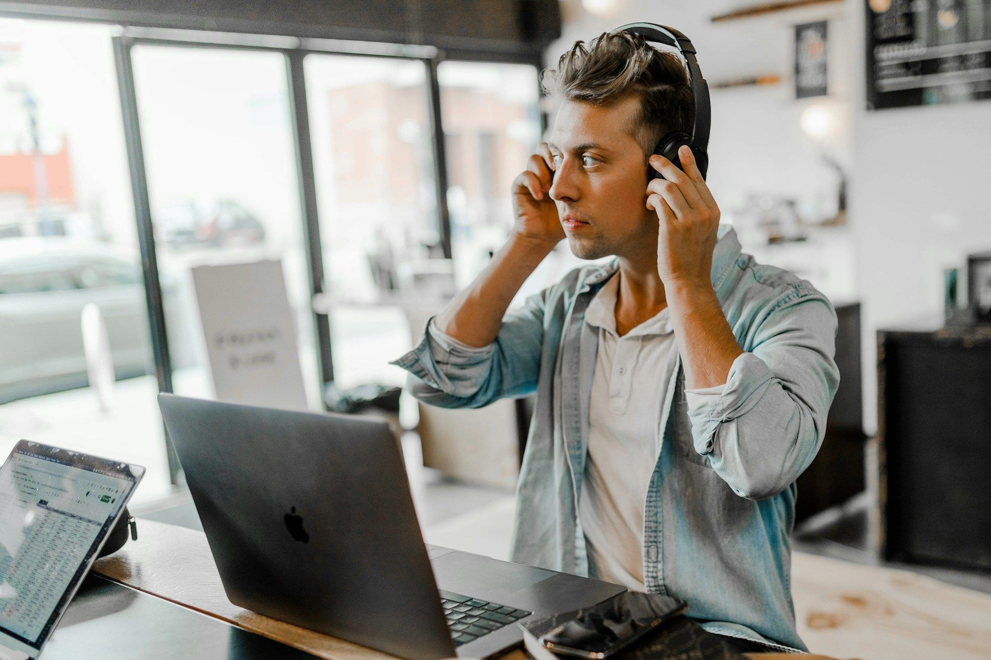 Support engineer at his desk handling a customer query